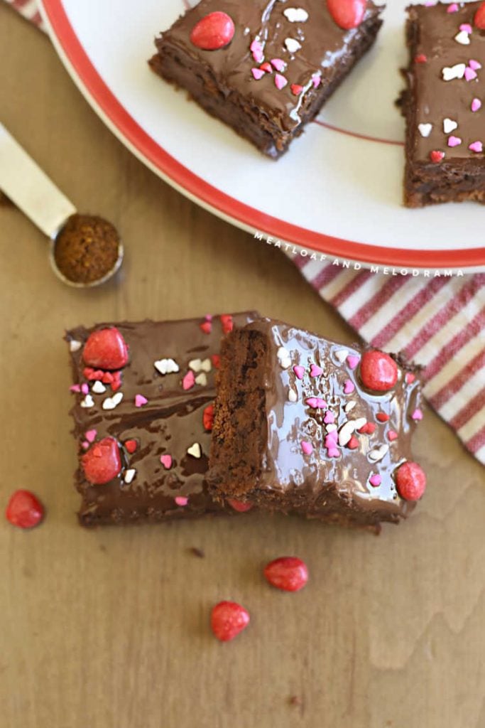 ancho chile brownies topped with chocolate glaze and valentines candy