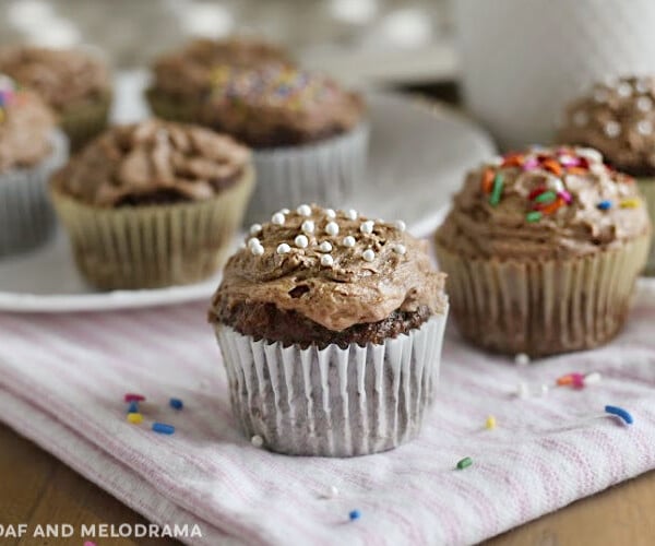 2 ingredient chocolate cupcakes with chocolate frosting and sprinkles