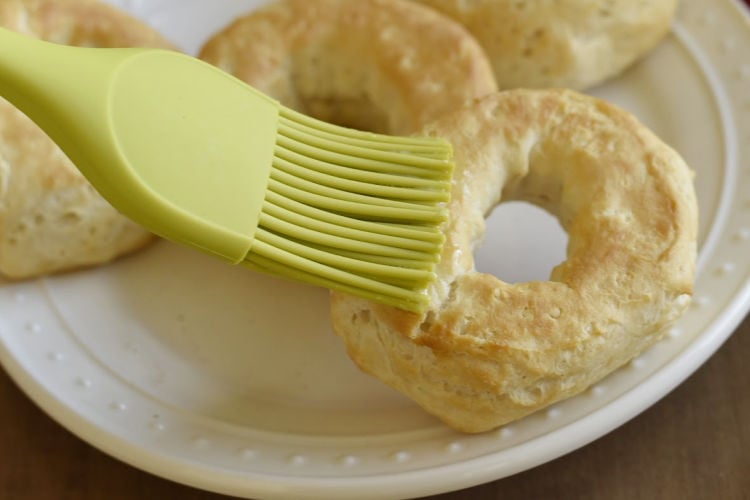 brush donuts with melted butter