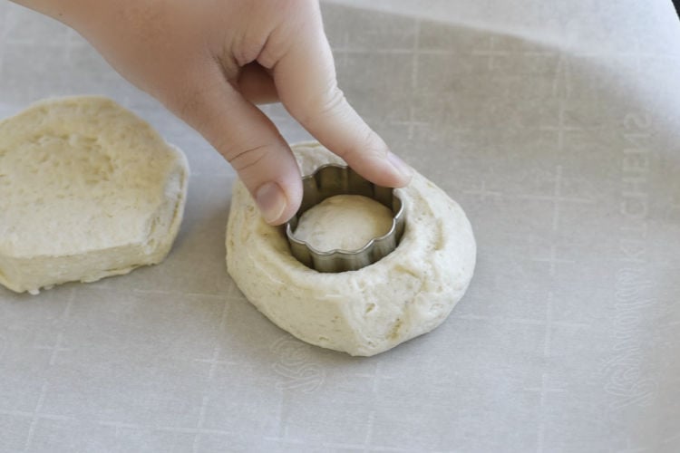 cut hole in biscuit with small cookie cutter