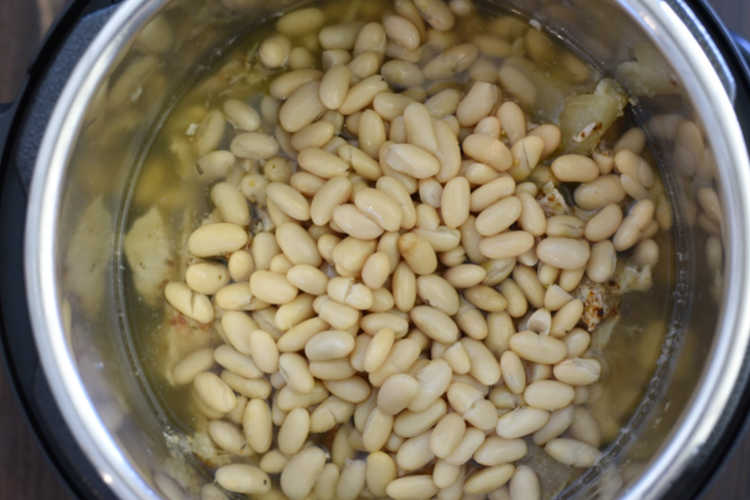 pork chili verde with white beans in the pressure cooker