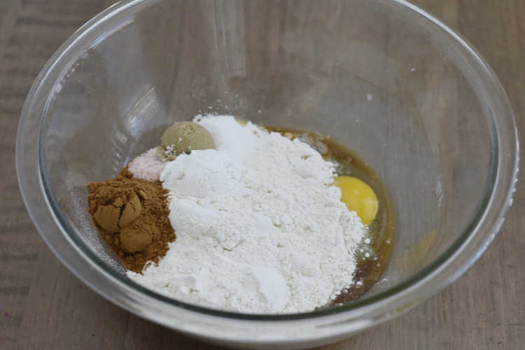 ingredients for pancakes in one mixing bowl
