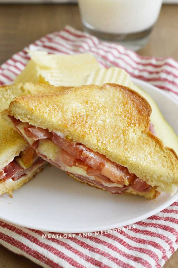 fried jumbo bologna sandwich with provolone and tomatoes