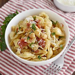 bowl of shell pasta with chickpeas and tomatoes made in Instant Pot