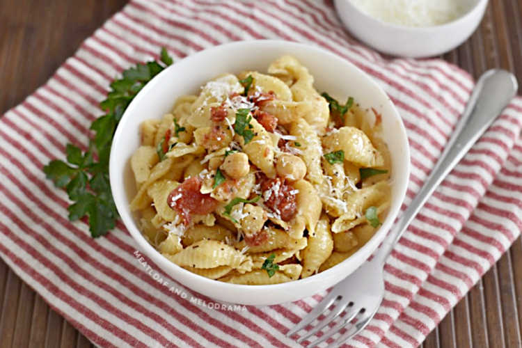 bowl of shell pasta with chickpeas and tomatoes made in Instant Pot