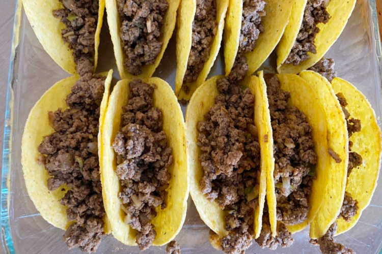 ground beef inside hard corn taco shells