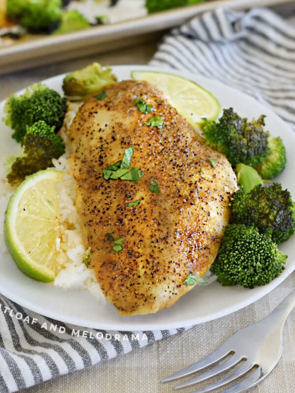 baked honey lime chicken with broccoli and rice on a plate