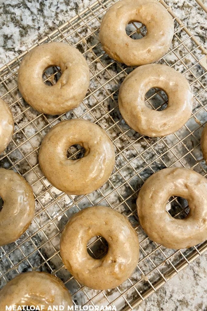 apple cake mix donuts cooking on wire rack
