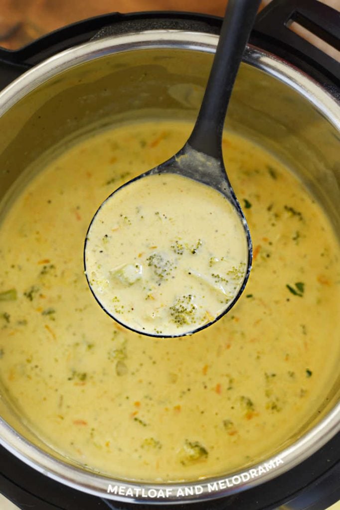 broccoli cheese soup in ladle over instant pot