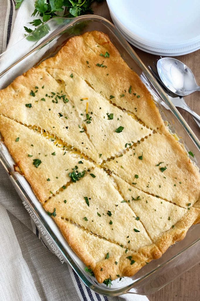 chicken bake in casserole dish with crescent dough crust