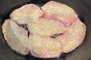 boneless pork chops with onion soup mix spices in the slow cooker