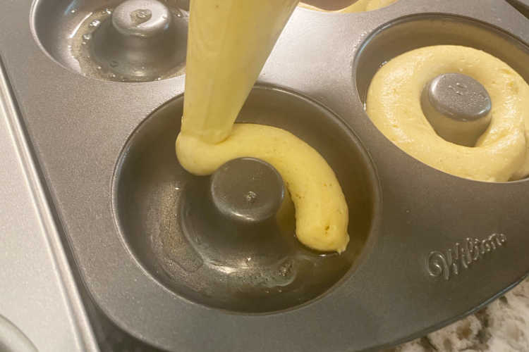 spoon batter into donut pan