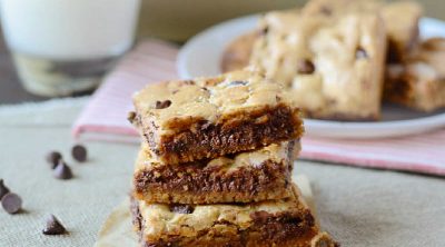 stack of chocolate chip cookie bars with milk