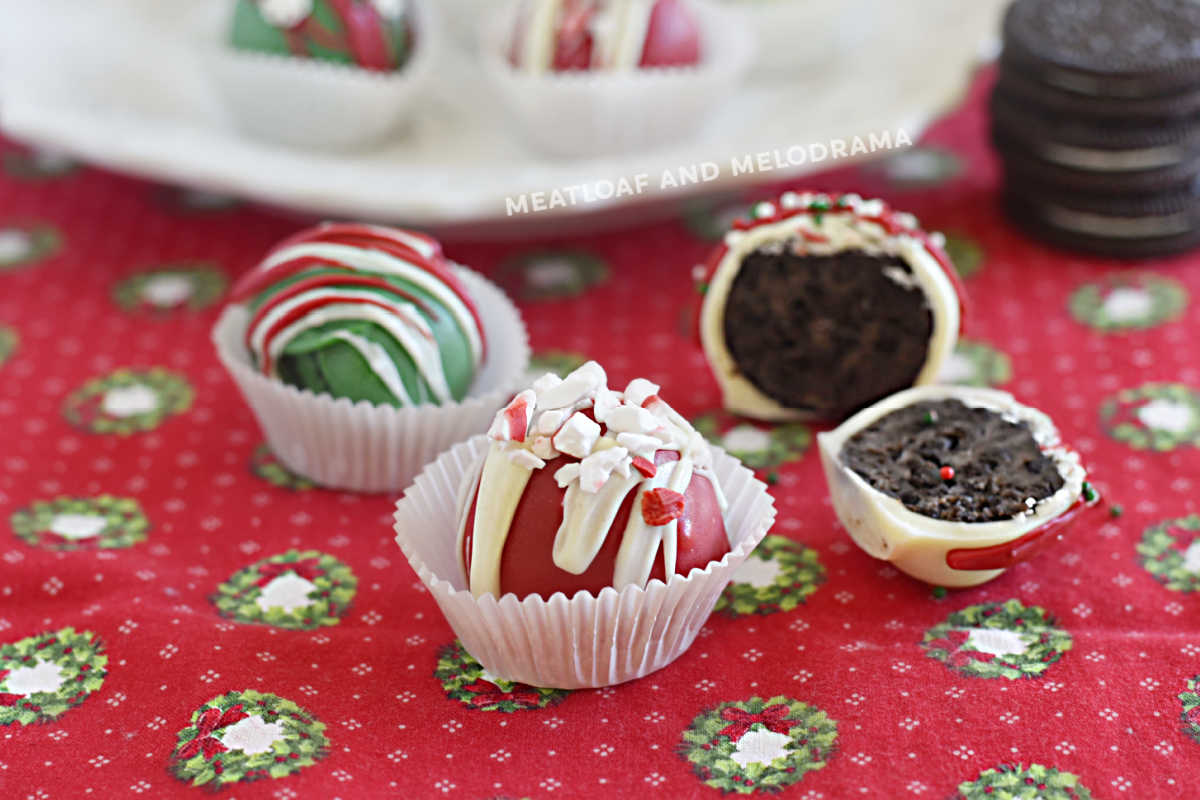  oreo cookie balls decorated with christmas colors on the table
