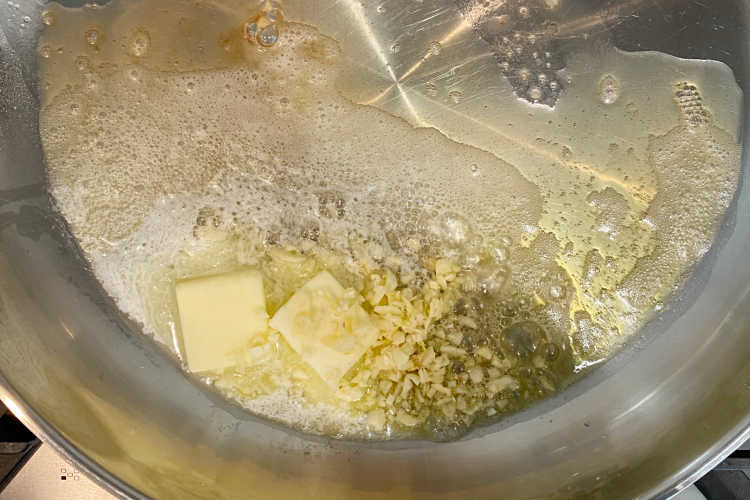 sauté garlic in butter and olive oil in skillet