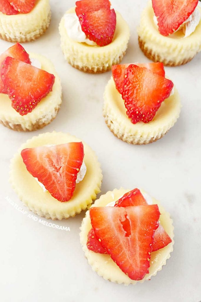 individual cheesecake bites topped with strawberries