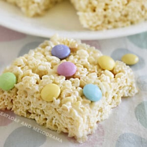 spring marshmallow rice krispie treats with pastel m and m candies on the table