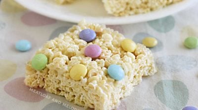 spring marshmallow rice krispie treats with pastel m and m candies on the table