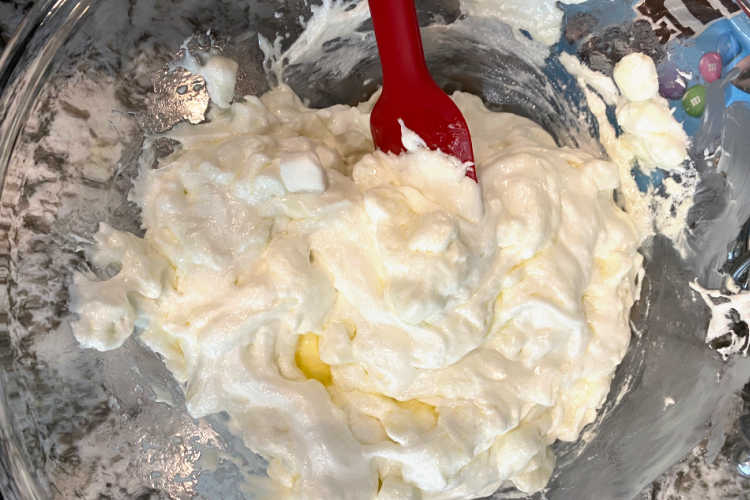 stir melted marshmallows and butter in mixing bowl