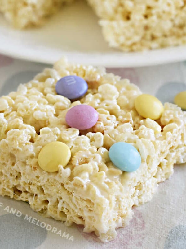 spring marshmallow rice krispie treats with pastel m and m candies on the table