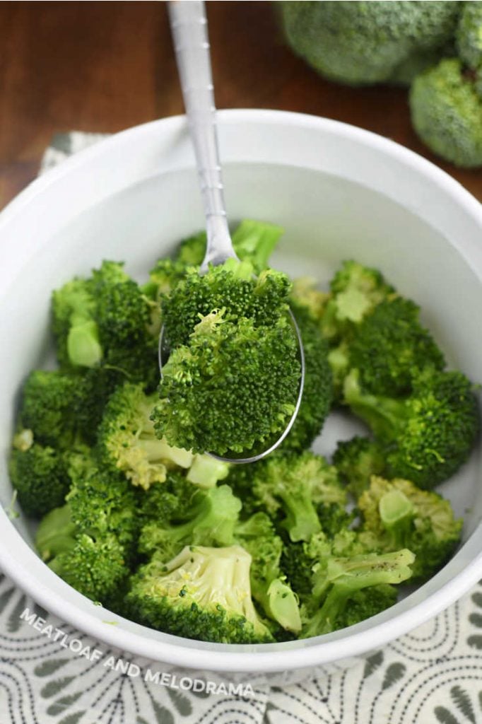 cooked broccoli on a serving spoon