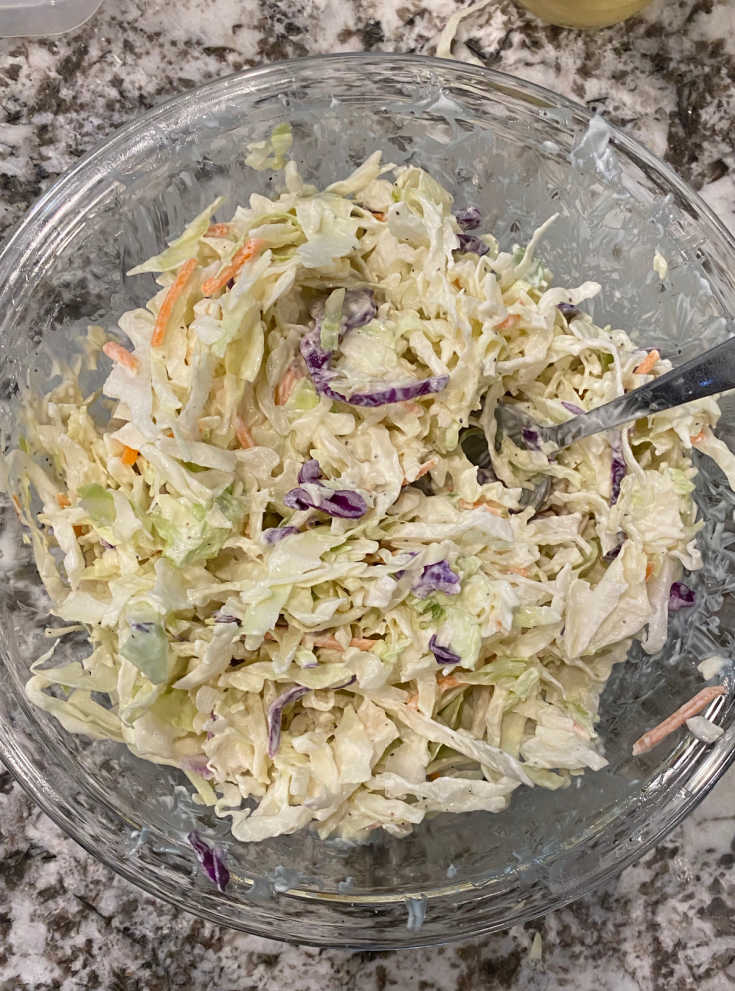 mix coleslaw ingredients together in mixing bowl