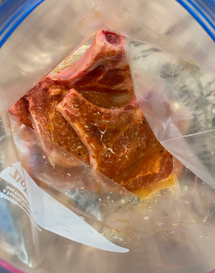 marinate pork chops in Italian dressing in freezer bag