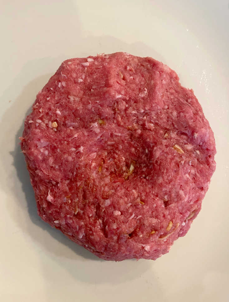hamburger patty with indentation in the middle