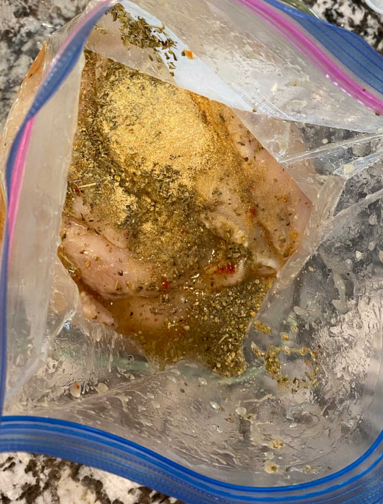 chicken breasts in freezer bag with salad dressing
