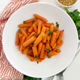 microwave cooked carrots in white bowl