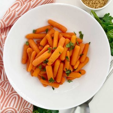 microwave cooked carrots in white bowl