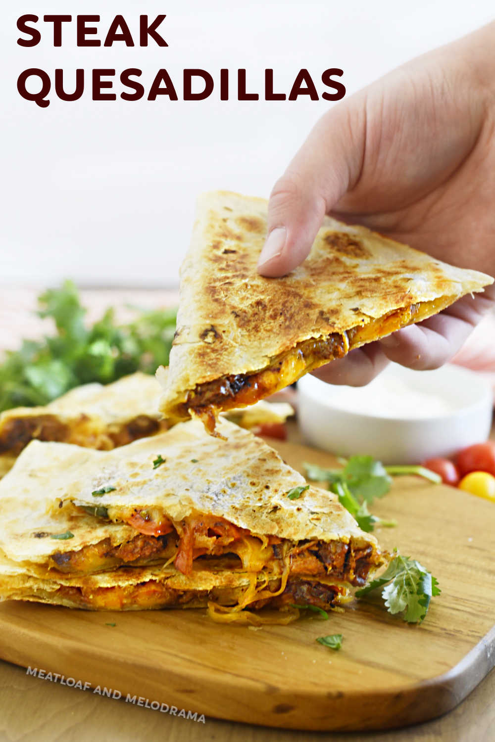 This Steak Quesadilla Recipe made with leftover steak, melted cheese, onions and peppers on a crispy tortilla is quick, easy and delicious! Skip takeout and save money when you make quesadillas at home for a simple lunch or dinner! via @meamel