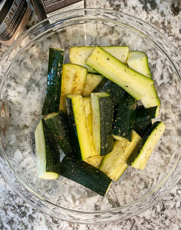 cut seasoned zucchini in mixing bowl