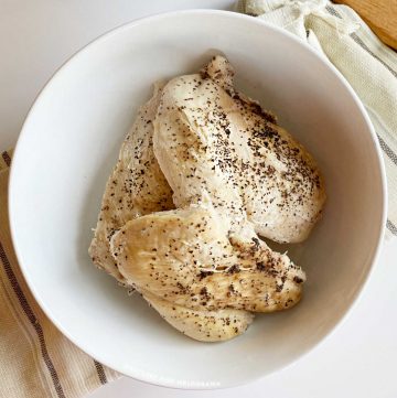 instant pot frozen chicken breasts cooked in white bowl