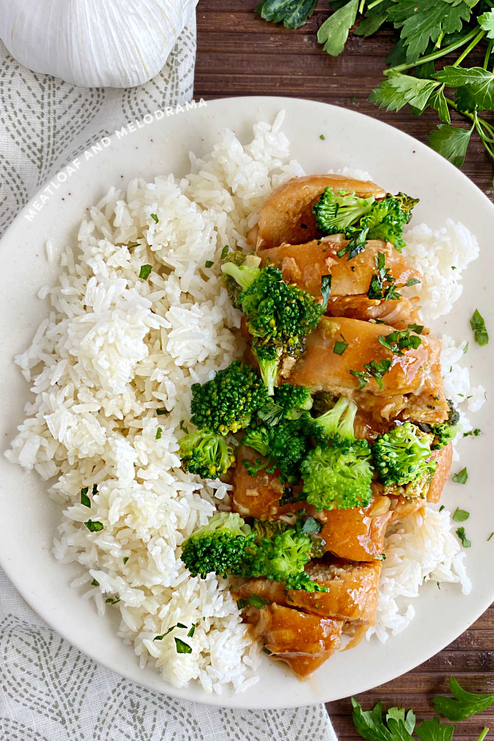 honey garlic chicken with broccoli and jasmine rice on a plate