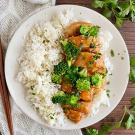 instant pot honey garlic chicken and broccoli on white plate with rice