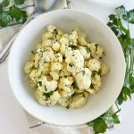microwave cauliflower in white serving bowl