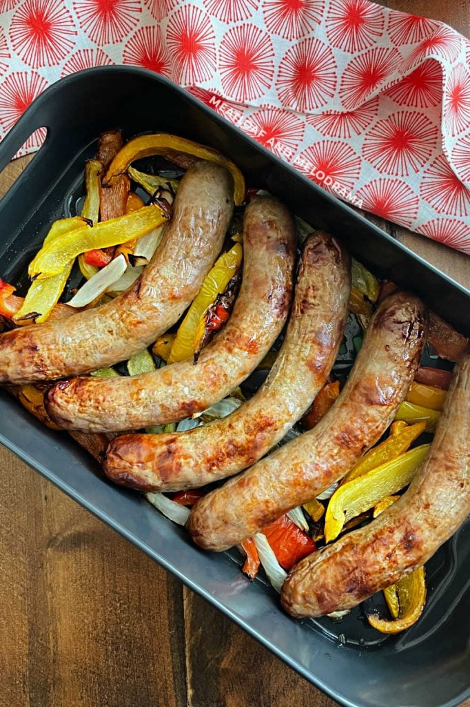 italian sausages, peppers and onions in ninja foodi grill xl air fryer tray