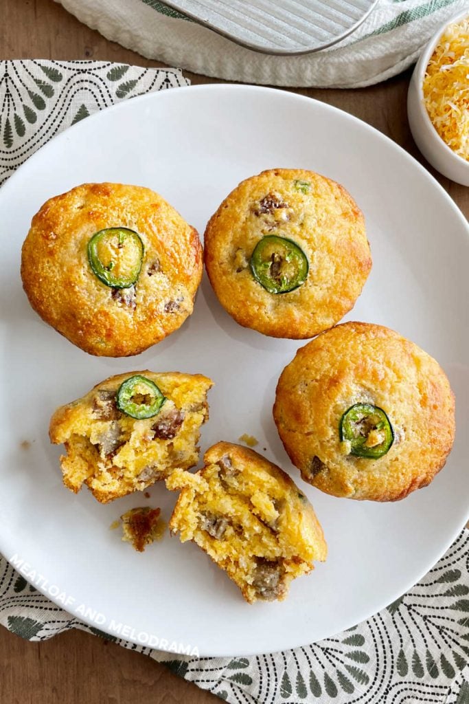 jalapeno cheddar corn muffins with sausage on white plate