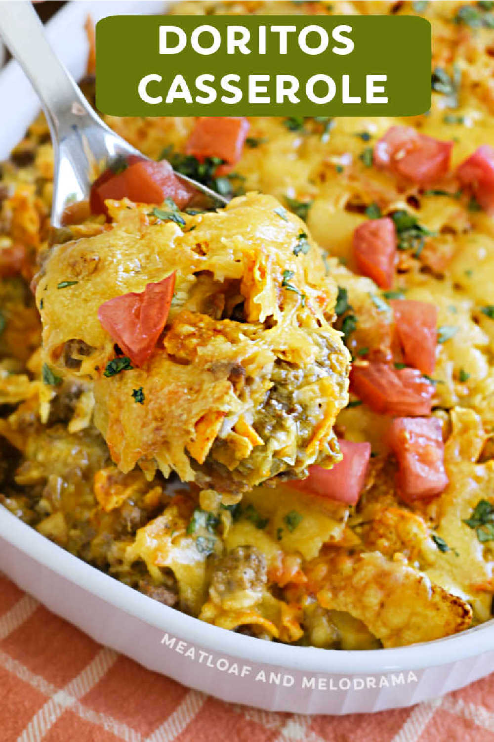 Easy Dorito Casserole recipe made with ground beef, taco seasoning, cheese, salsa, sour cream and Doritos tortilla chips is a family favorite! This delicious dinner is comfort food your whole family will enjoy! via @meamel
