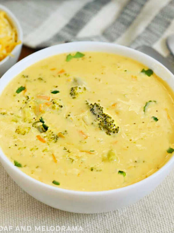 bowl of instant pot broccoli cheddar cheese soup on the table