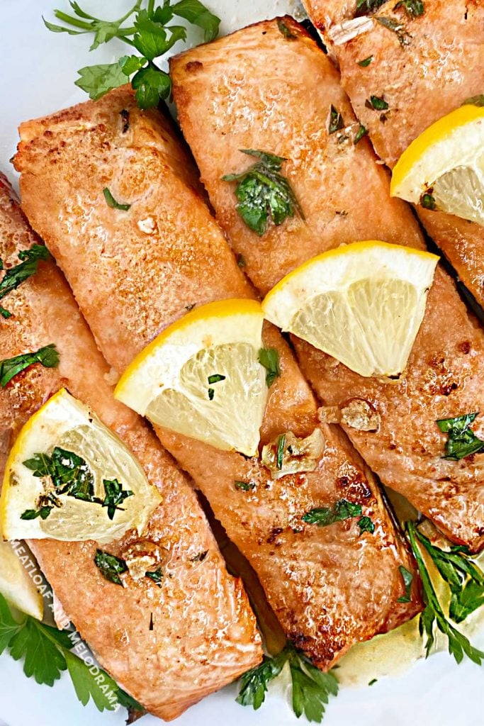 overhead view of grilled lemon garlic salmon with parsley