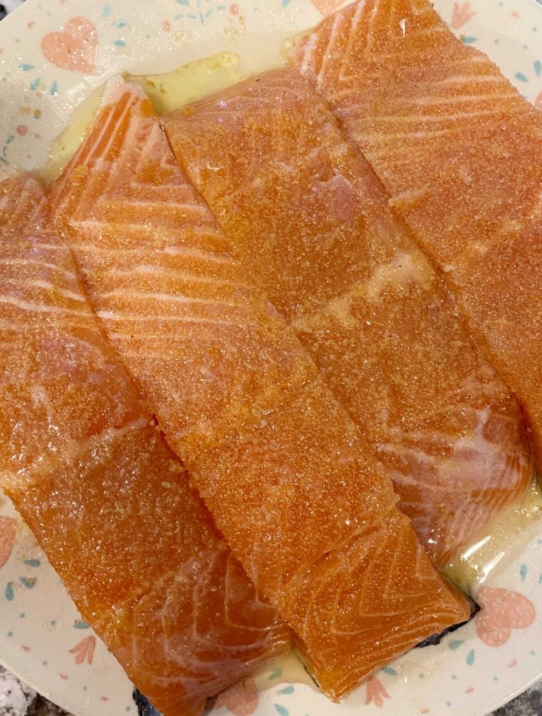 seasoned raw salmon on a plate