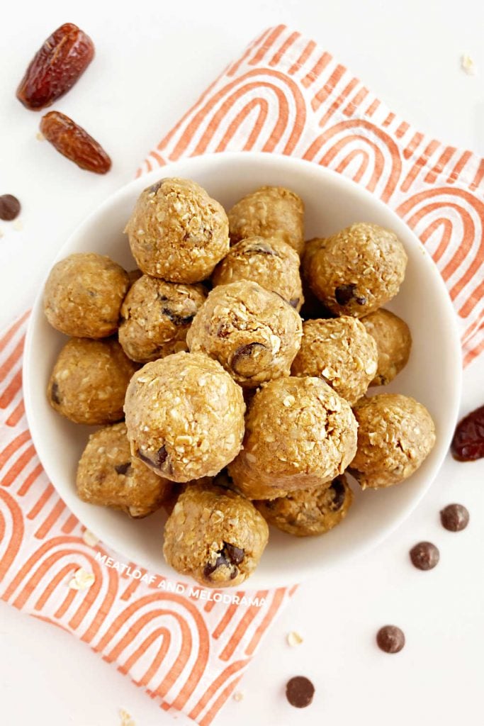peanut butter energy bites in a white bowl on the table