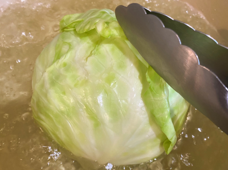 soften cabbage leaves for cabbage rolls in boiling water