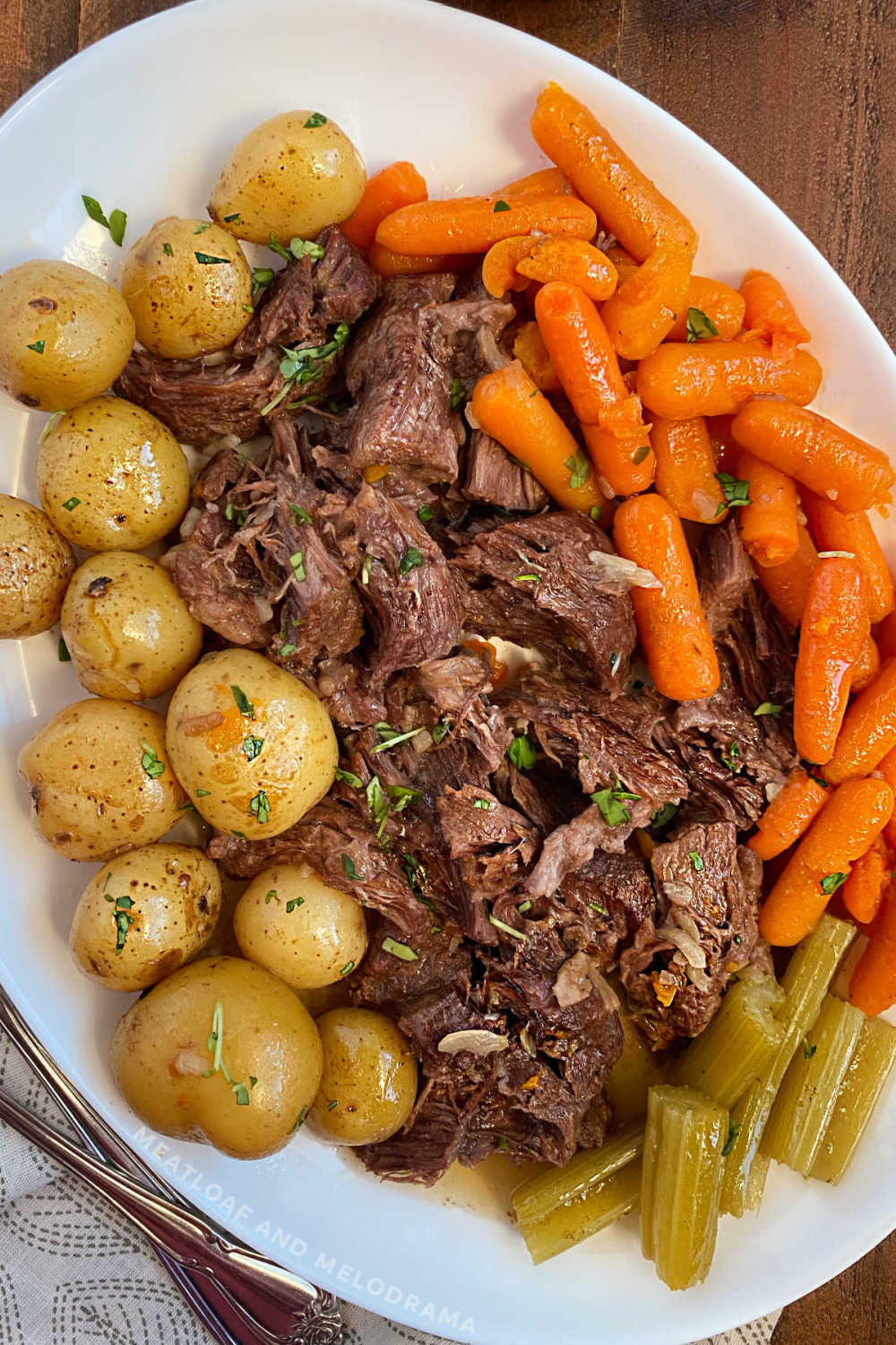 instant pot pot roast with onion soup beef chuck roast potatoes and carrots on platter