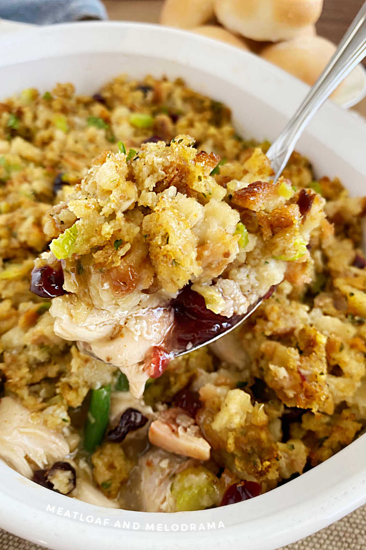 leftover turkey and stuffing casserole on a serving spoon