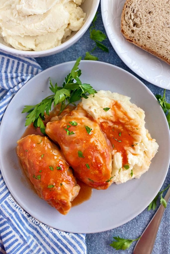stuffed cabbage rolls in tomato soup sauce with mashed potatoes
