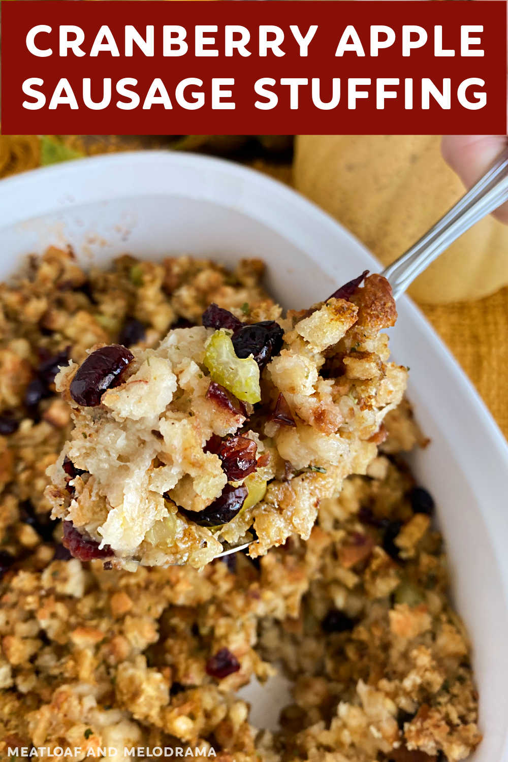Cranberry Apple Sausage Stuffing is a delicious stuffing recipe with sourdough bread, tart apples, dried cranberries and savory sausage. This Thanksgiving stuffing recipe is the perfect addition to your holiday meal! via @meamel