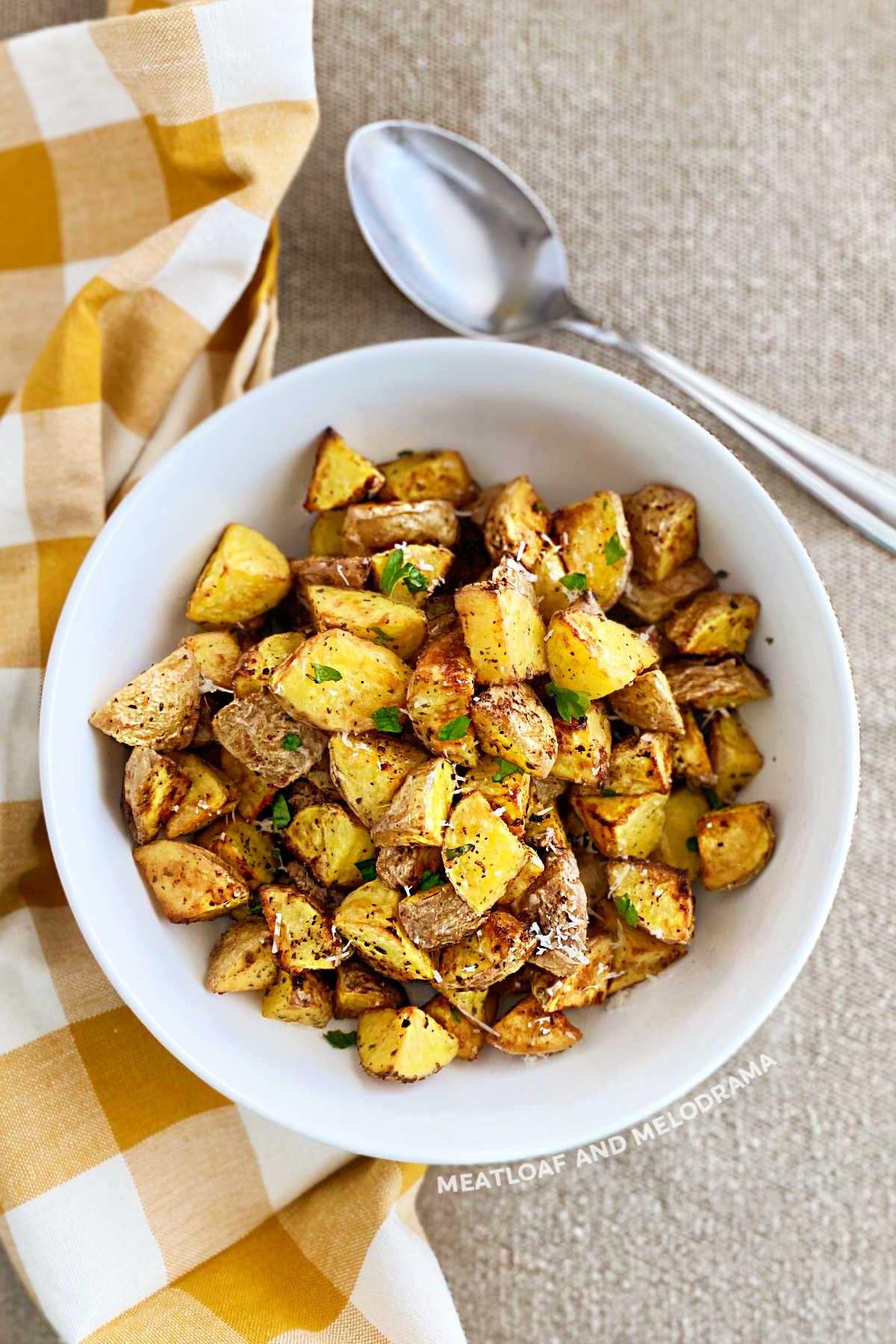 air fried baby yellow potatoes in white bowl